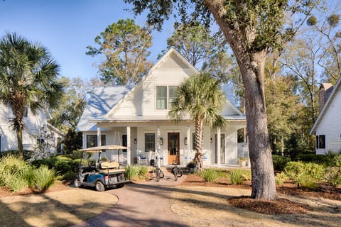 Front of the cottage has a golf cart that the owner allows renters to use.