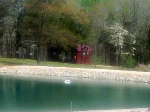 OUTSIDE FRONT CABIN 2 SHOWING POND