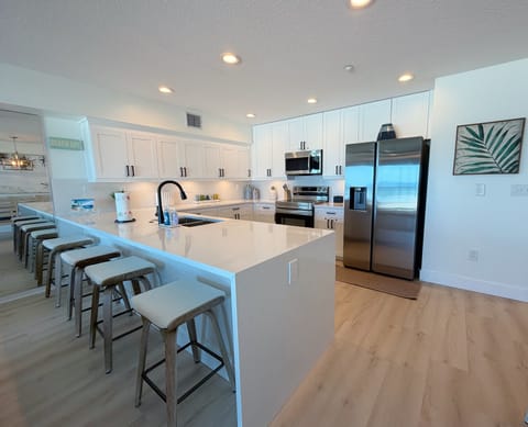 Bar stool seating off of the kitchen for quick meals and family - Bar stool seating off of the kitchen for quick meals and family time.