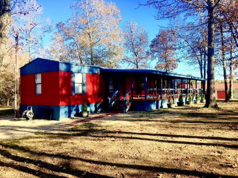 Front View Showing Porch & 2 Double Swings