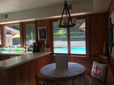Built in banquette in kitchen...view of pool!