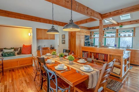 Alcove bedding with curtains for privacy beside dining area