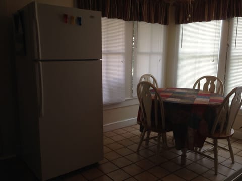 table for four overlooks porch and side yard