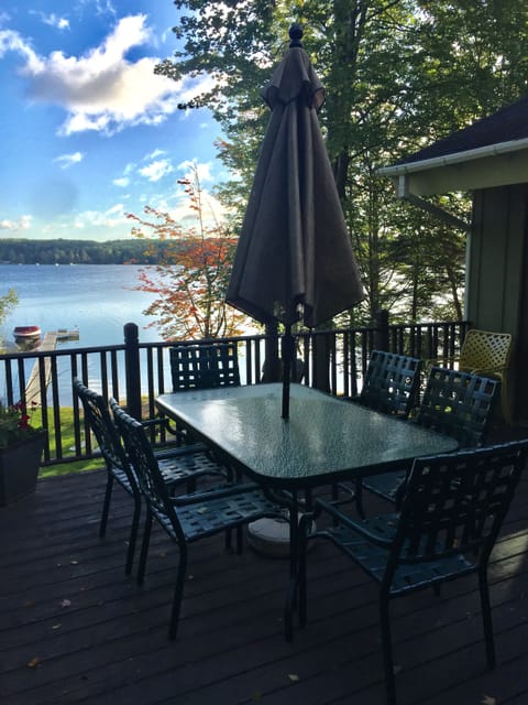 Outdoor dining on the upper deck (off sunroom). 