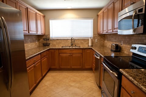 A Beautiful Kitchen Re-Built in 2012 with Granite and Stainless Steel Appliances