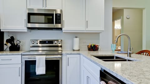 Fully stocked kitchen for cooking at home.