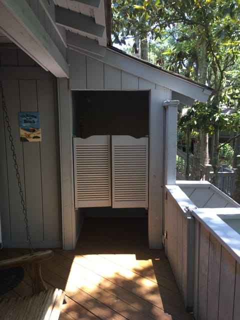 Gate that can lock to keep in  kids /pets Outside Shower 