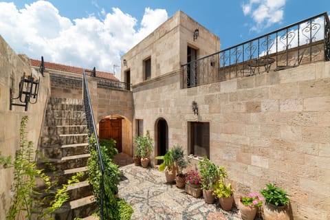 Wonderful spacious courtyard with stairs to Captains Suite and terrace