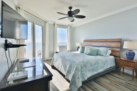 Gulf front master bedroom with a king size bed.