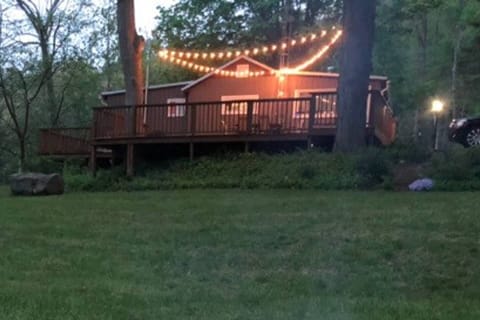Cabin with evening deck lights
