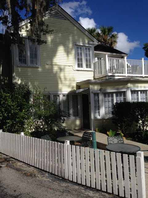 back of house showing Penthouse Patio and sitting area outside