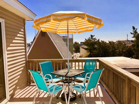 Bistro Table w/6' Parasol on South Facing Balcony at Le Beach House Montreuil