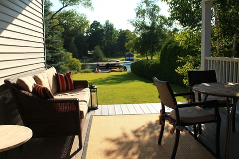 Lovely waterfront property on Lake Leelanau. Private setting on 1.6 acres
