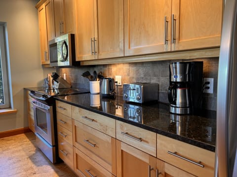 Exceptional kitchen with every appliance and utensil required.