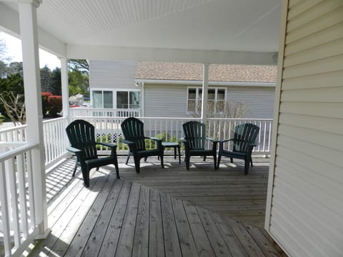 Front Porch wraps to screened porch and rear deck