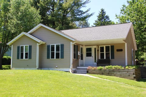 House has a large fenced in yard in the back. Check out the video.