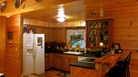 Fully equipped & well stocked Kitchen with seating for 3 at the Breakfast Bar
