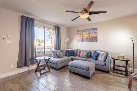 Spacious living area boasts lots of natural light.