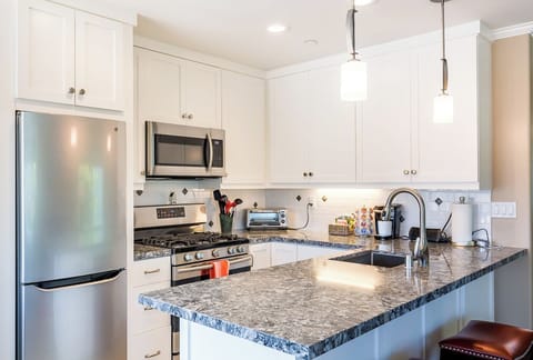 Great little kitchen with dishwasher and gas range.