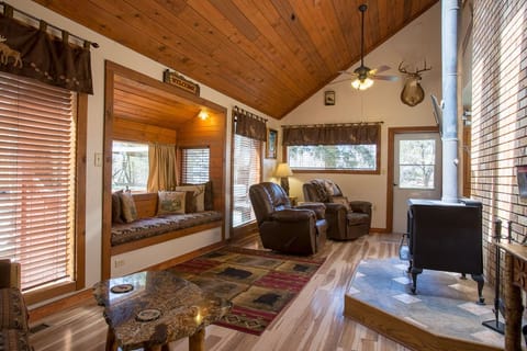 Log furnishings, ceiling fans, woodstove
