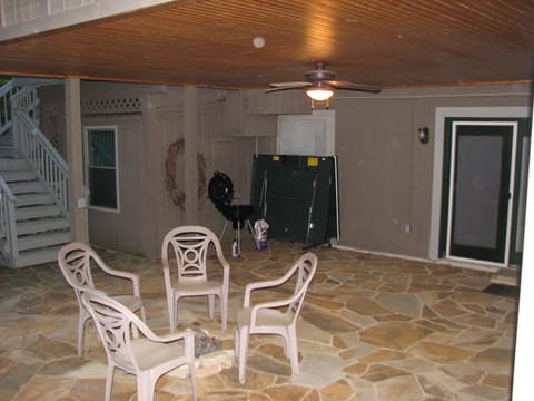 The covered patio also houses ping-pong and the barbecue for four-season fun!