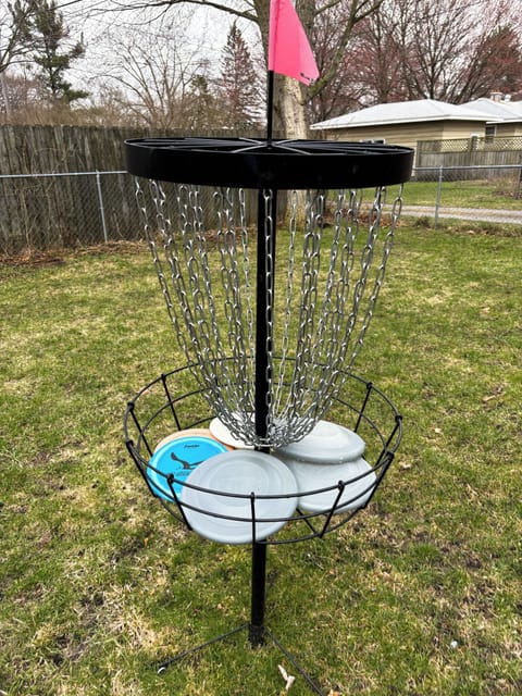 backyard is large and spacious with Frisbee golf gane