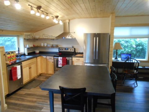 Modern, fully stocked kitchen.