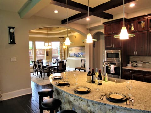 Right Side of Kitchen Overlooking Dining Room/Lake/Deck
