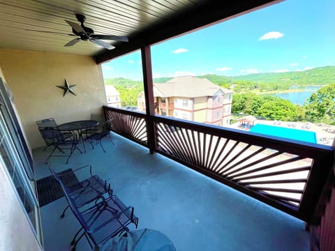 Condo deck overlooking the pool and Table Rock Lake