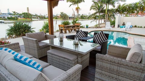 Relax under the Bali Hut blissfully gaze across the pool and north facing water.