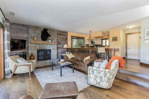 The living room flows into the dining area and the kitchen in an open floor plan