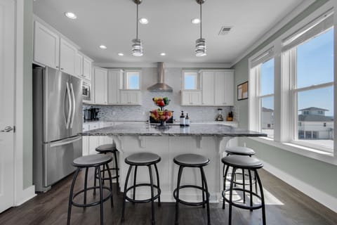 large kitchen, fridge w/ ice-maker, dishwaster, microwave, double oven, pantry