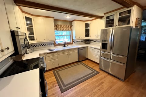 Main level kitchen is fully furnished and has everything you can possibly need!