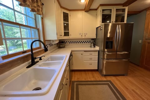 Main level kitchen is fully furnished and has everything you can possibly need!