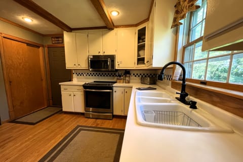 Main level kitchen is fully furnished and has everything you can possibly need!