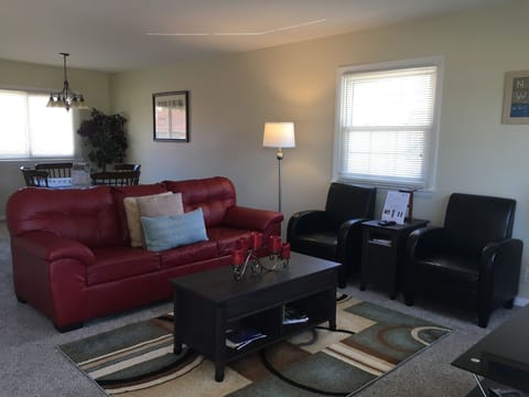 Living room with new sofa and chairs that make you feel right at home. 