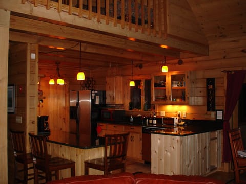 Open kitchen with plenty of room for prep. High end appliances and kitchen tools