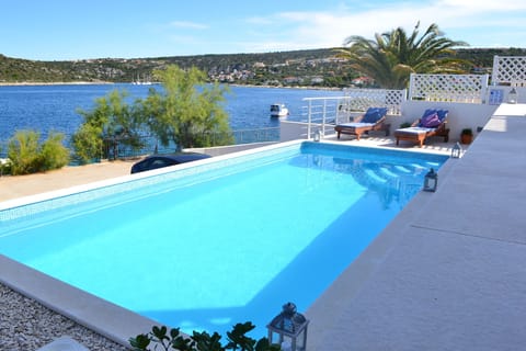 private pool in front of the house, 10 meters from sea