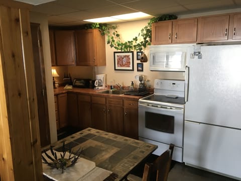 Kitchen and eating. Also a large dining area out on patio