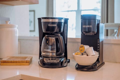 Both a Keurig and drip coffee maker are provided with starter sets of coffee.