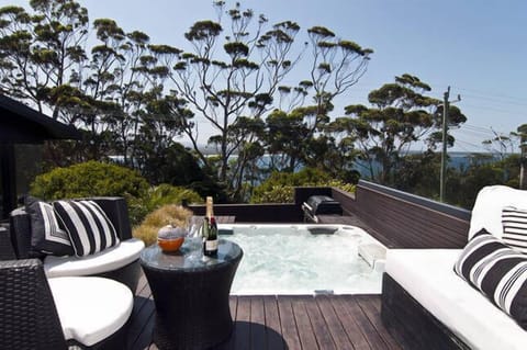 Sit in the spa sipping champayne after a hard day at the beach or after golf