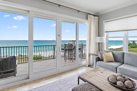 Adagio C205 - Welcome to Adagio C205, a stunning Gulf-front corner residence offering the perfect blend of luxury, comfort, and breathtaking coastal views. This spacious four-bedroom retreat features an open-concept living area filled with natural light, seamlessly connecting to an oversized private balcony where you can take in sweeping views of the emerald waters and unforgettable sunsets.
