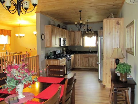 View of kitchen from 6 person dining table.