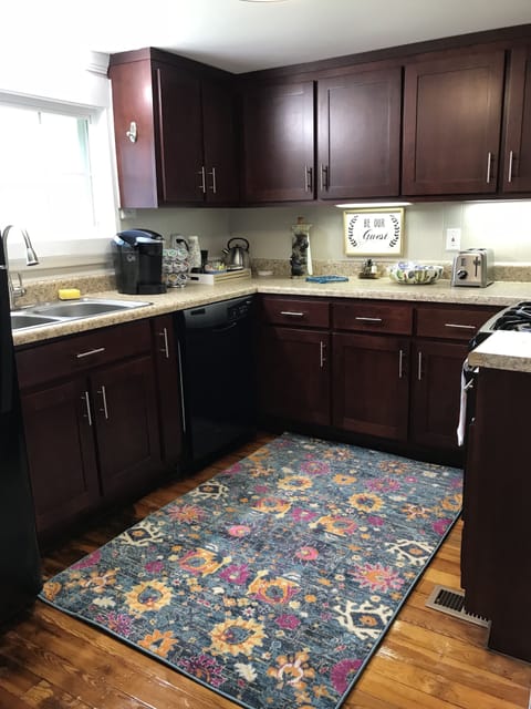 Keurig with coffee, tea, and condiments. Fruit & snacks, cooking basics.