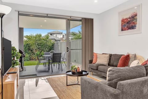 Seamless design: Open living, dining, kitchen flow to alfresco and yard. Modern, connected living. 