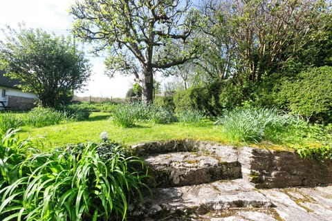 The cottage has a large, enclosed garden.