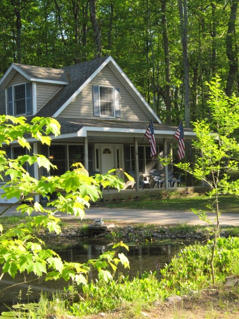 The porch overlooks the pond