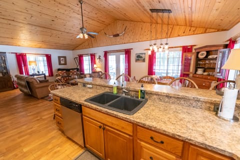 Kitchen stocked with appliances and serving ware