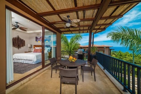 Dine al fresco with endless ocean views and tropical breezes.