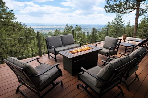 Cozy and comfy seating on the huge deck with 50 mile views over the City. 